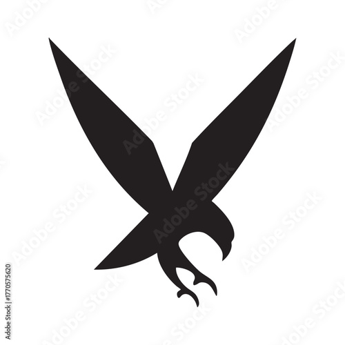 A striking black silhouette of a bird with outstretched wings flying