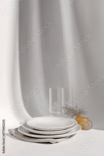 Monochrome Minimalist Dining Setup with White Plates and Abstract Shadows