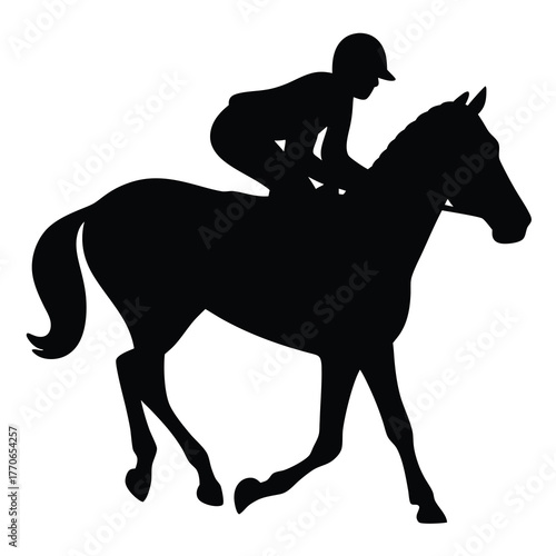 Silhouette of a jockey riding a horse in a race at full speed