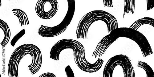 Minimalist black and white abstract pattern of hand-drawn arcs for modern design