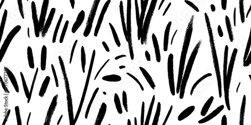 Minimalist abstract pattern of grass blades in black and white for background design
