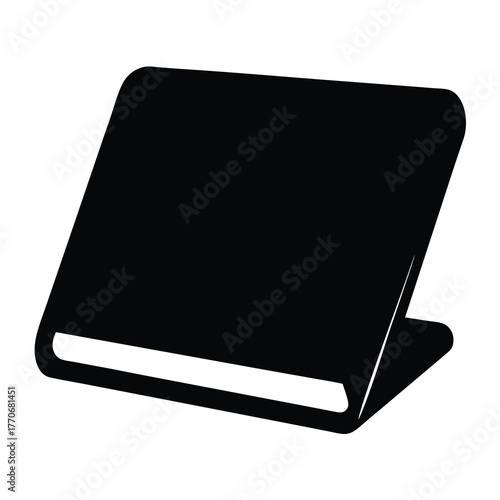 Black silhouette of a book, standing open on a surface in perspective
