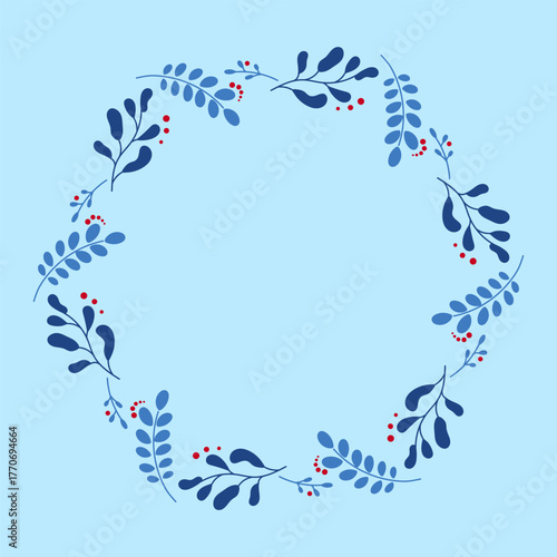 Elegant blue winter wreath with leaves and red berries. Seasonal botanical design for xmas and new year greetings, holiday cards, festive invitations, and winter celebration decorations. circle frame