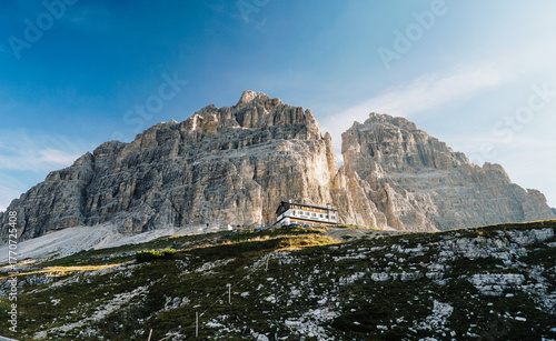 Photos Mountain hut beneath sheer rock ramparts