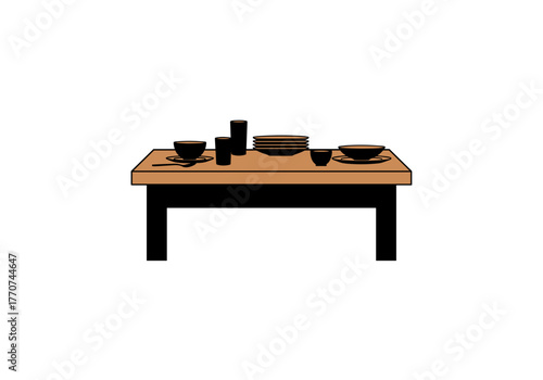 Simple wooden table with plates and cups arranged neatly  