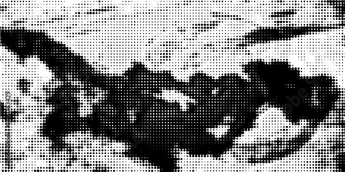 Halftone faded gradient texture. Grunge halftone grit background. White and black sand noise wallpaper.
