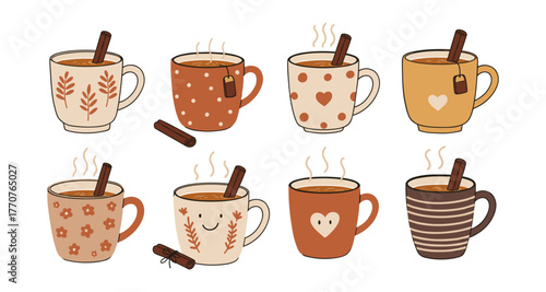 Cute autumn tea mugs with cinnamon sticks and steaming hot beverages