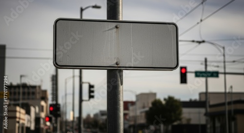 Blank canvas: Urban street scene with empty sign ready for customization