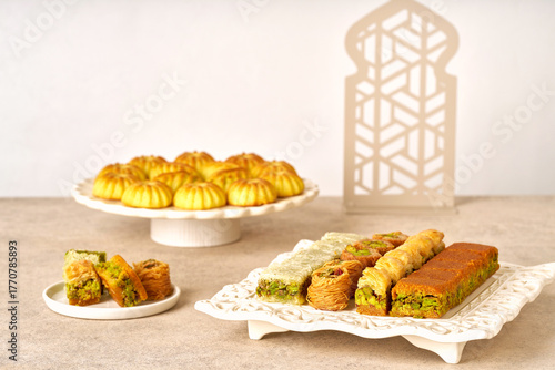 Assorted baklava and semolina maamoul or mamoul cookies. Traditional arabic Eid al Adha, Eid al Fitr , Ramadan sweets