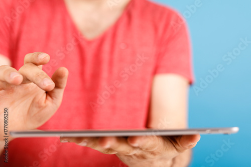 Person holding a tablet dev...