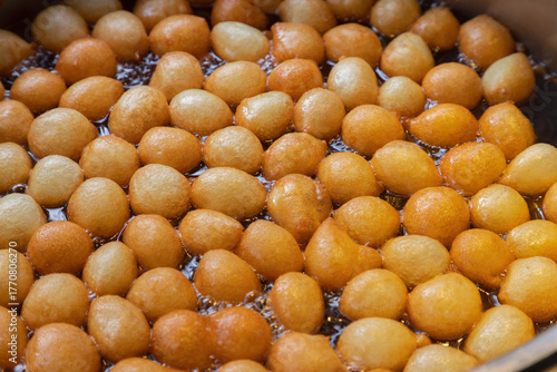 Traditional Turkish fried dough balls in syrup.