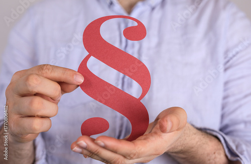 Image of hands holding a re...