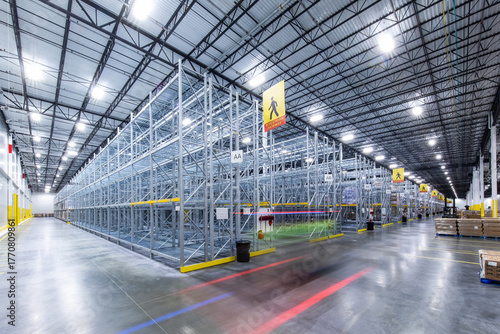 Interior of modern warehouse with empty racking system design for cold storage	