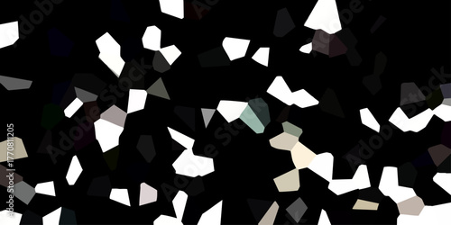 Abstract geometric mosaic pattern with irregular polygons in dark and light tones on a black background