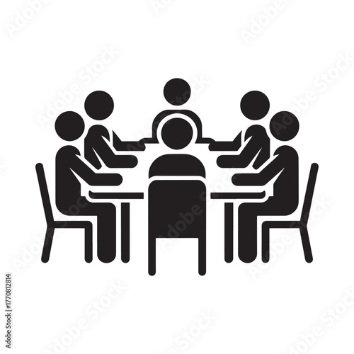 Diverse group of people in a meeting around a table discussing ideas