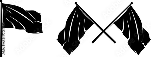 Black flags waving on poles and crossed