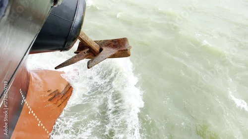 Real footage of cargo ship dropping anchor — chain running, splashes, and full anchoring process filmed onboard. Filmed from multiple angles, showing authentic seamanship and shipboard operations.