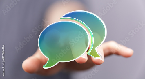 Person holding speech bubbl...