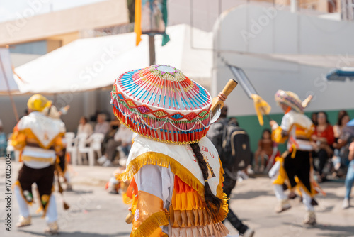 Sonajeros dancers wearing colorful traditional costumes, in the popular festival honoring Saint Joseph and the Holy Family in Zapotlan el grande, Ciudad Guzmán, Jalisco, Oct.2, 2025. Tuxpan
