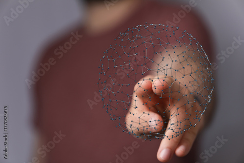 Close-up of a hand touching...