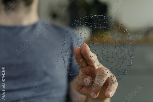 Close-up of a hand touching...