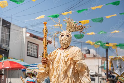 Sonajeros dancers wearing colorful traditional costumes, in the popular festival honoring Saint Joseph and the Holy Family in Zapotlan el grande, Ciudad Guzmán, Jalisco, Los Mazorqueros