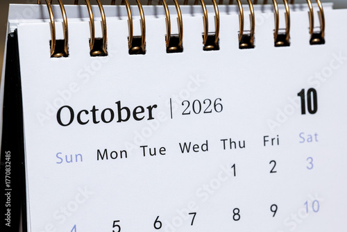 October 2026 monthly calendar page close up, minimal design planner showing days of the week and dates for time management and organization concept