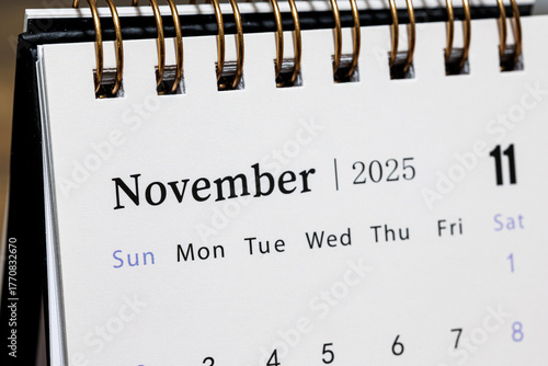 Minimalist desk calendar showing November 2025 with focus on Saturday, November 1, representing the beginning of a new month and planning concept.