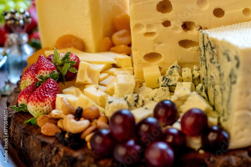 Charcuterie board with cheese, fruits and grains