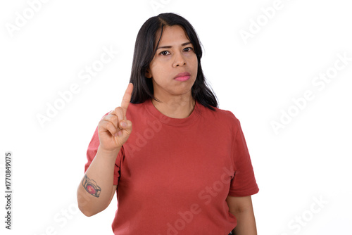 woman wearing a red shirt on a white background making a no sign, negation