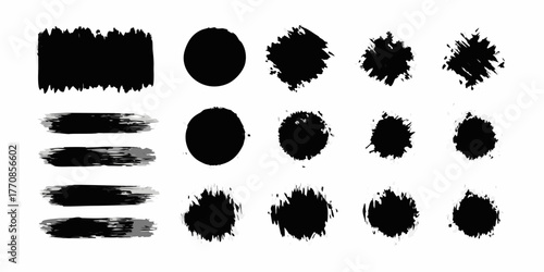 Collection of black grunge brush stroke shapes and paint splatters on white background