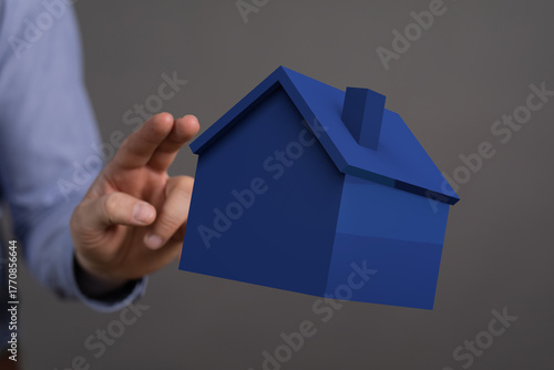 A hand delicately holding a...