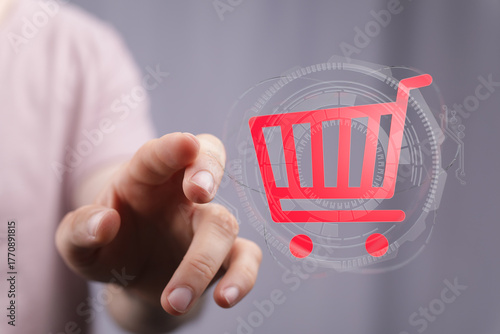 Hand touching digital shopp...