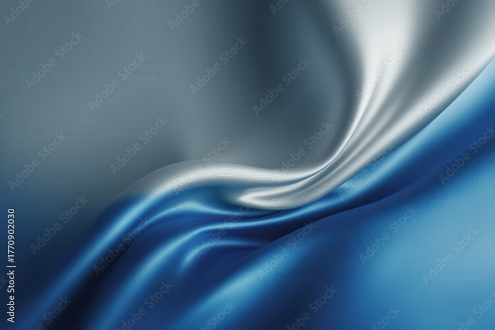 Naklejka premium Blue and silver satin fabric with soft folds and elegant texture on minimal background