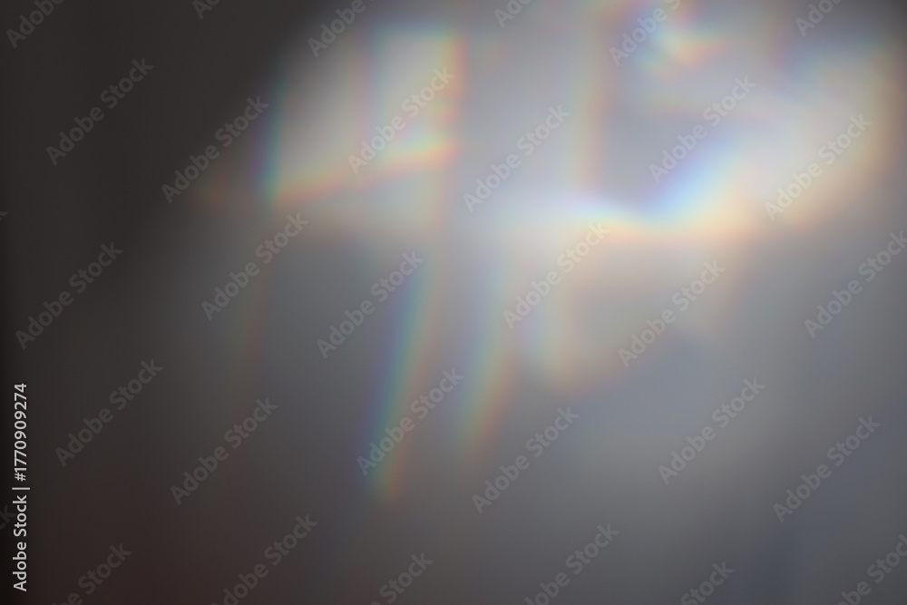 Naklejka premium Soft focus gray grain blur texture wall with prism refraction. Light and shadow smoke abstract gradient rays background.