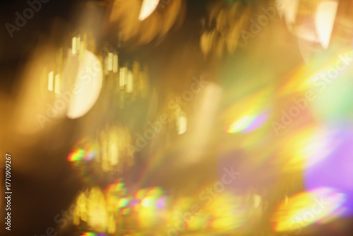 Smoke Abstract blur soft focus blinking light copy space background. Light and shadow gold rays refraction.