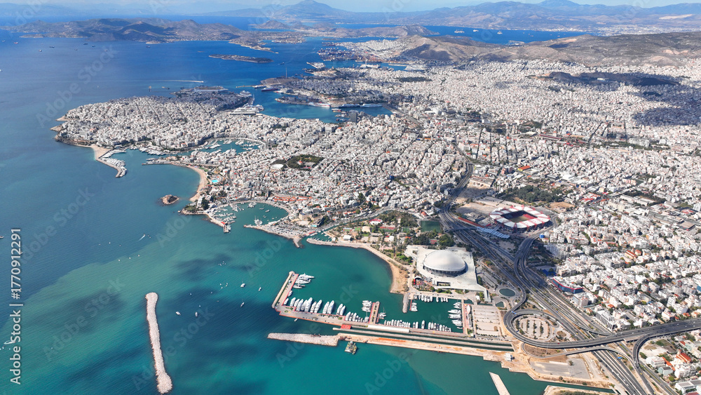 Obraz premium Aerial drone photo of famous port of Piraeus, Marina Zeas, Tourkolimano and area of Phaliron as seen from high altitude, Attica, Greece