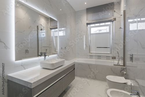 Wallpaper Mural Modern bathroom design featuring marble tiles and sleek fixtures in a bright, spacious setting Torontodigital.ca