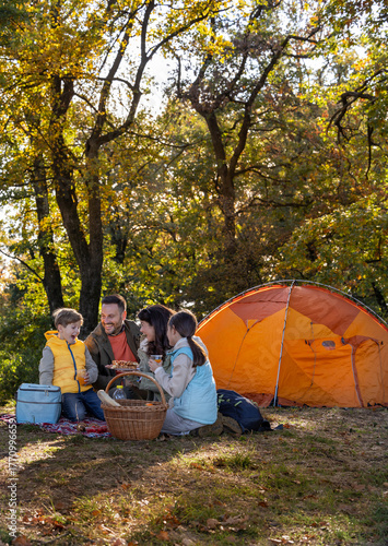 Family having lunch while camping