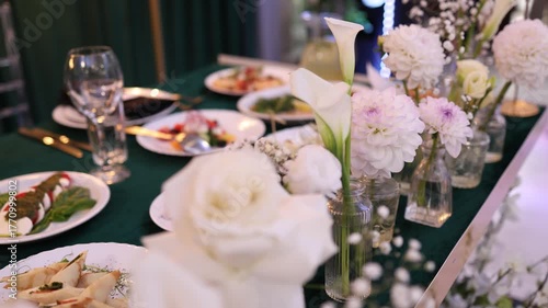 White wedding table with food and decorations