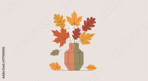 Autumnal arrangement featuring colorful leaves in a vase with fallen leaves on a neutral background color