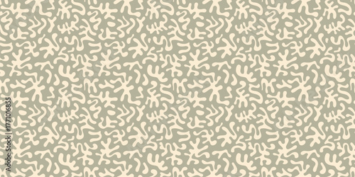 Vector abstract seamless pattern with organic shapes, funky chaotic doodle elements. Groovy cut-out texture. Simple camouflage green background. Trendy repeating design
