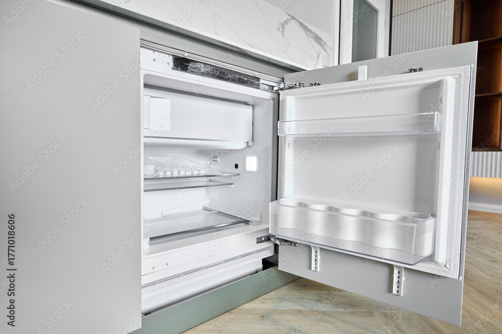 Fototapeta premium Modern refrigerator with open doors showcasing organized interior and sleek design features