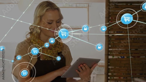 Small retail owner tapping tablet generating secure ecommerce shopping-cart padlock network