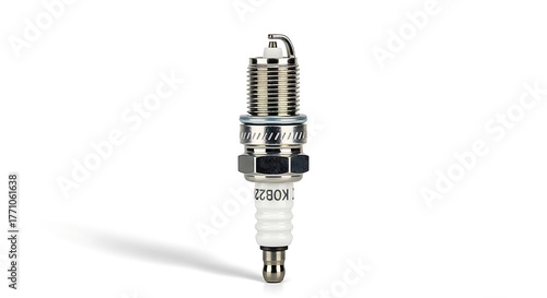 A single spark plug with a white ceramic insulator and metal threading, isolated on a white background.