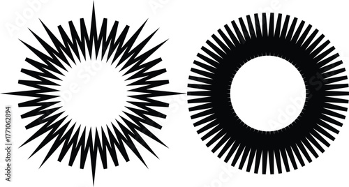 Two abstract black starburst or sunburst shapes with radial lines on a white background