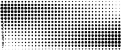 Dotted halftone gradient texture. Fading polka dot background. Repeated dots gradation pattern background. Black vanishing comic pop art overlay backdrop.