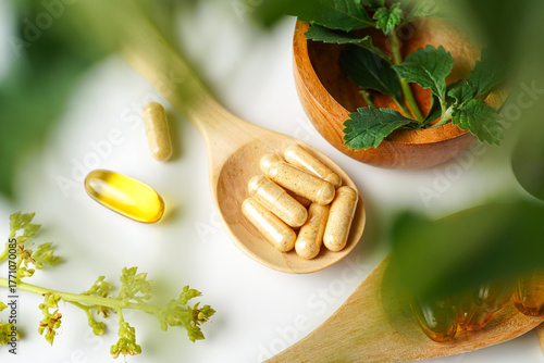 Medicine herbal organic capsule vitamin E omega 3 fish oil drug herbs leaf natural supplements