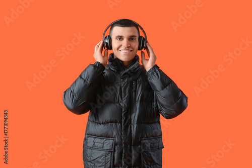 Young man in winter clothes...