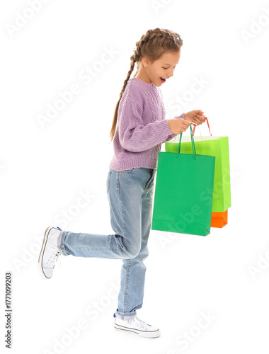 Little girl with shopping b...